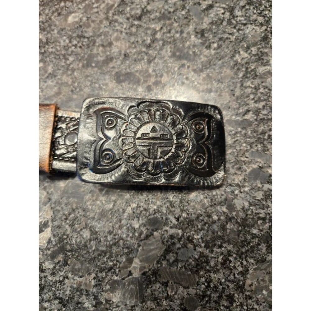 Vintage leather tooled belt buckle, Southwestern Zuni, sun face sun face